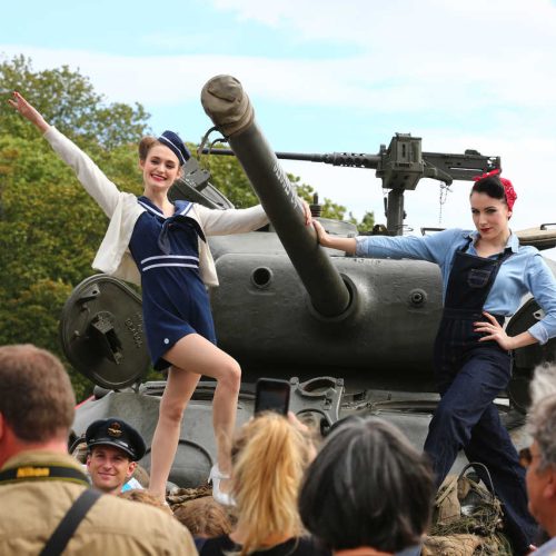 Brussels liberation day participants on a tank